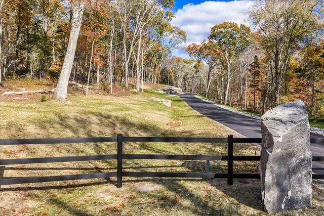 a backyard of a house with lots of green space