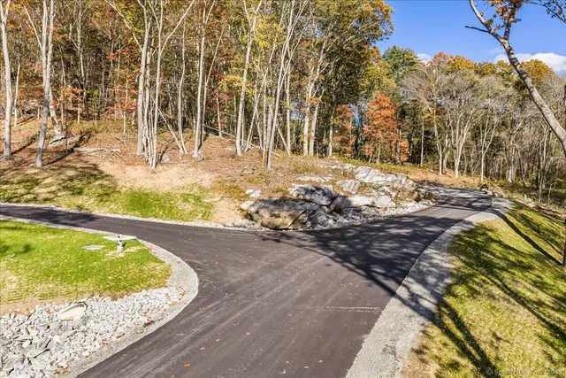 a view of swimming pool with a patio