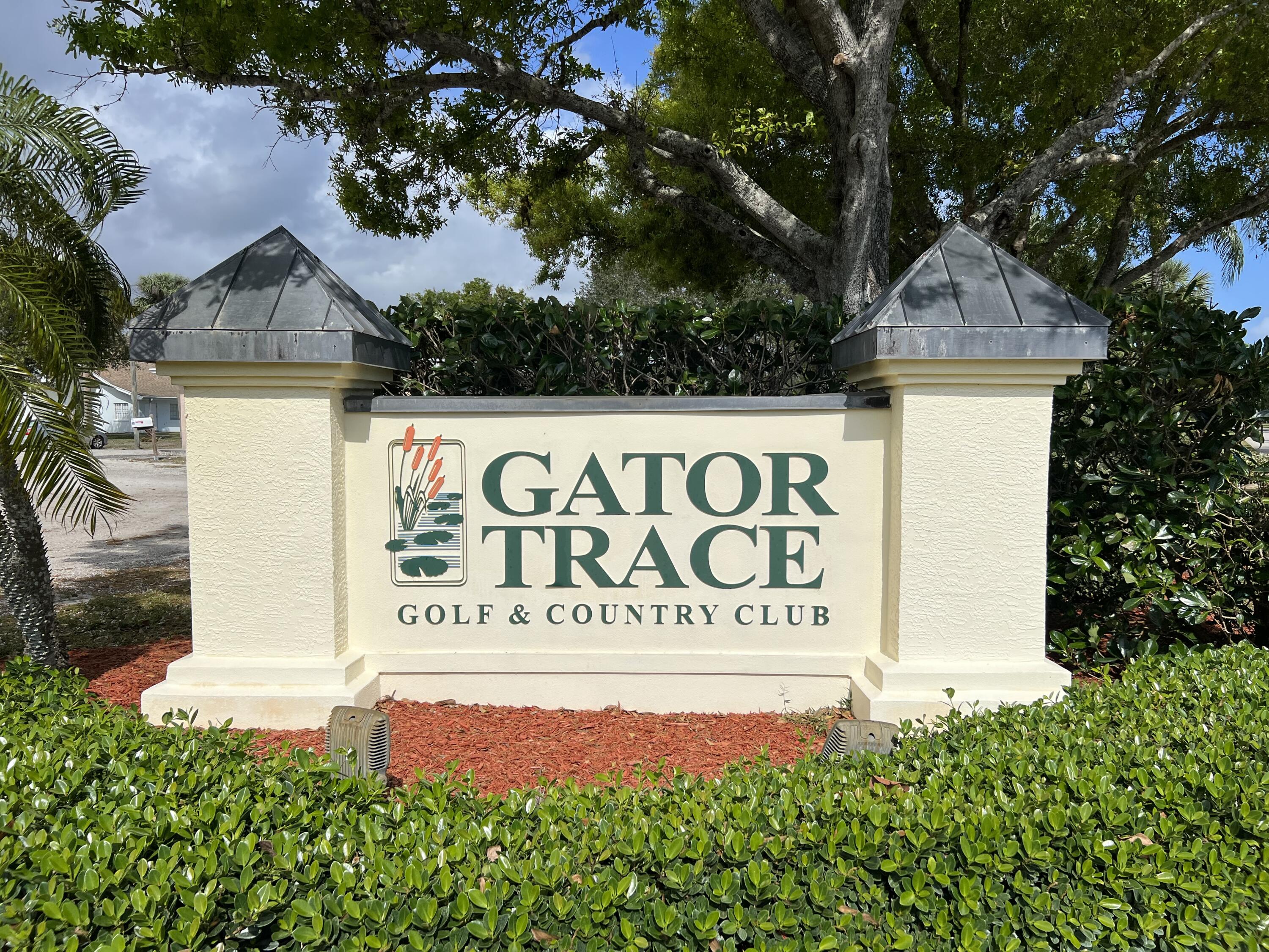 4042 Gator Trace Road Fort Pierce, FL 34982 - Photo 26 of 28 gator trace entrance sign 2