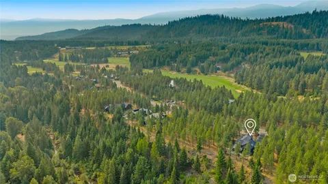 a view of lake with green space
