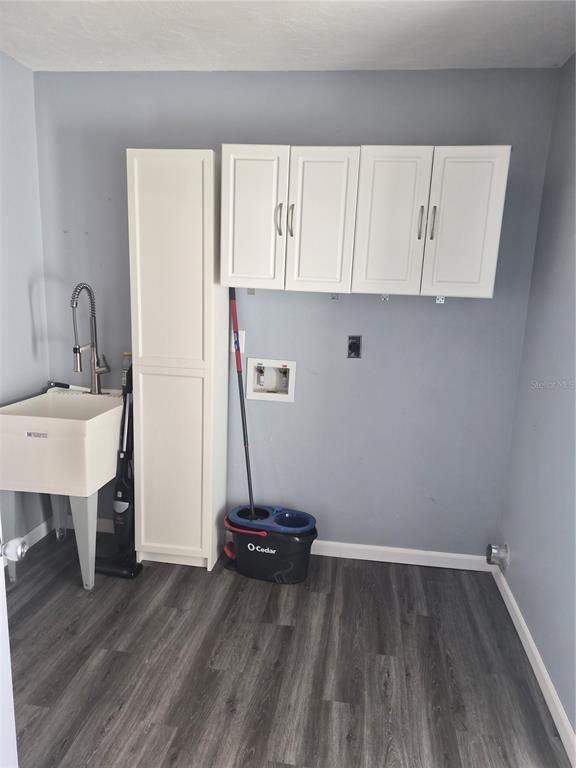 1080 Leeward Road Venice, FL 34293 - Photo 11 of 33 a view of a room with wooden floor and a sink