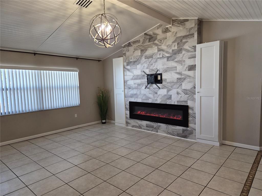 1080 Leeward Road Venice, FL 34293 - Photo 19 of 33 a view of wooden floor cabinetry and a kitchen counter
