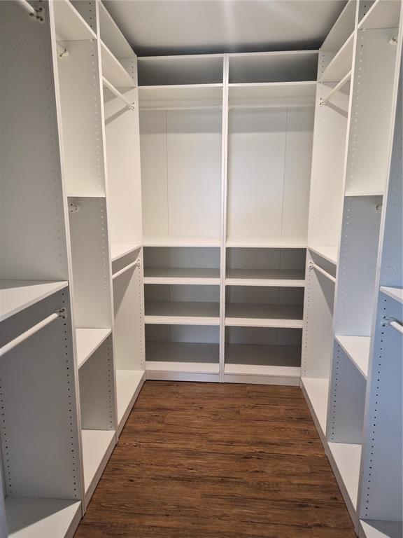 1080 Leeward Road Venice, FL 34293 - Photo 27 of 33 a view of walk in closet with empty racks