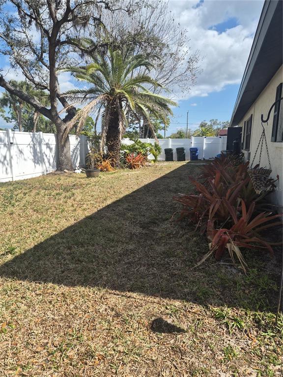 1080 Leeward Road Venice, FL 34293 - Photo 31 of 33 a view of a yard with an trees