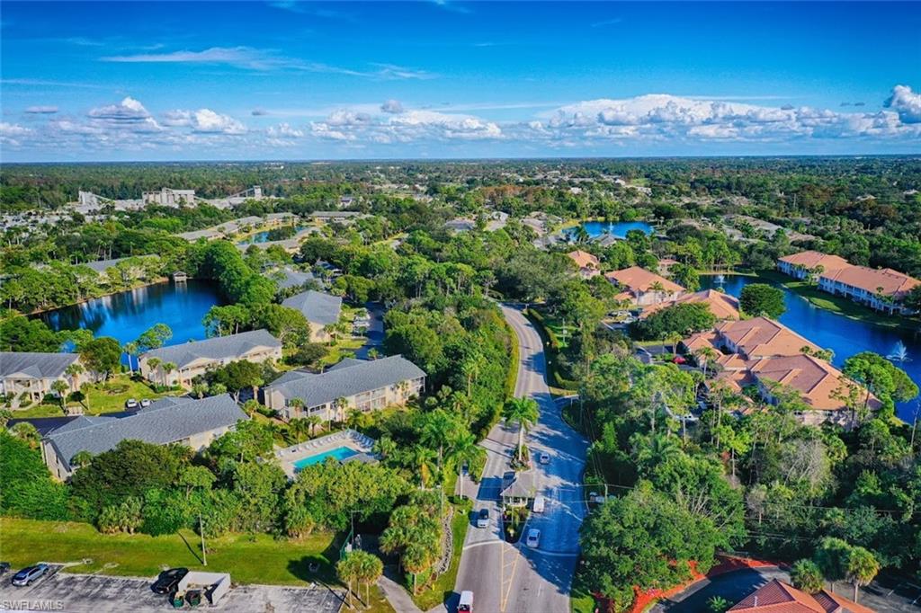 1220 Sarah Jean Circle, Unit L103 Naples, FL 34110 - Photo 18 of 23 a view of a city