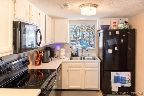 $219,900 | 74 Eleven W Court, Unit 2C, Sunrise Beach, MO 65079
