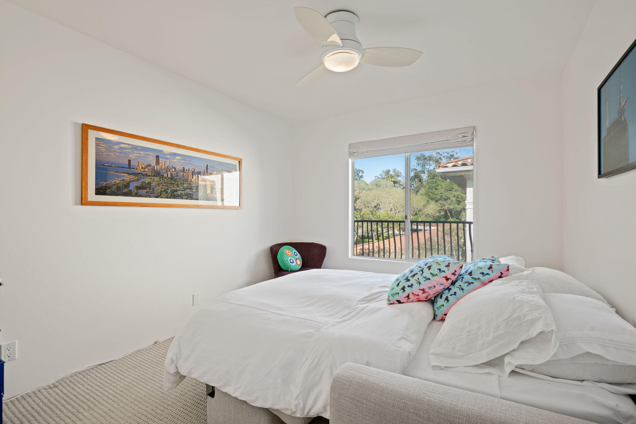 269 Por La Mar Circle Santa Barbara, CA 93103 - Photo 12 of 26 a bed sitting in a bedroom next to a window