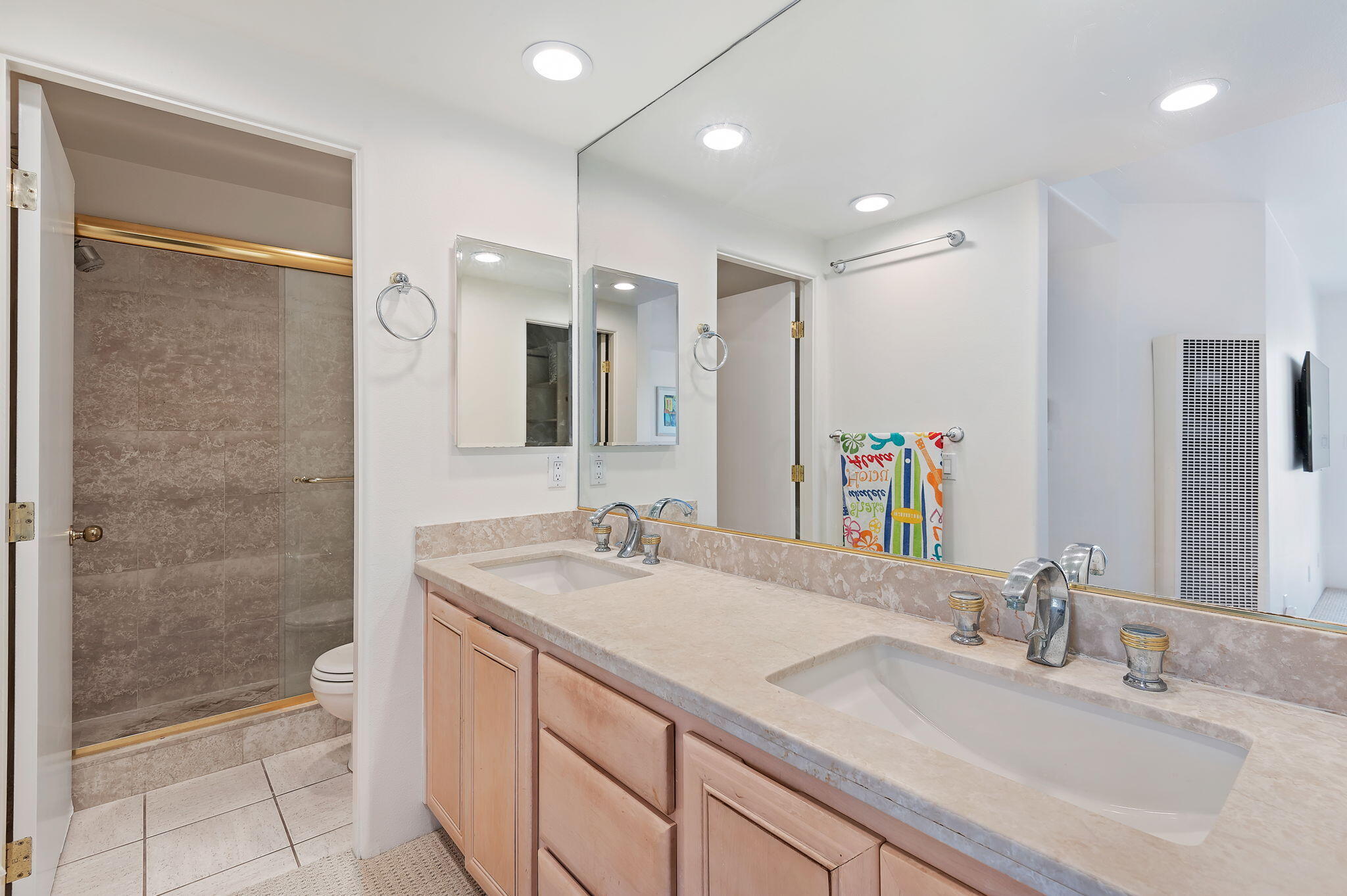 269 Por La Mar Circle Santa Barbara, CA 93103 - Photo 14 of 26 a bathroom with a granite countertop sink mirror and double