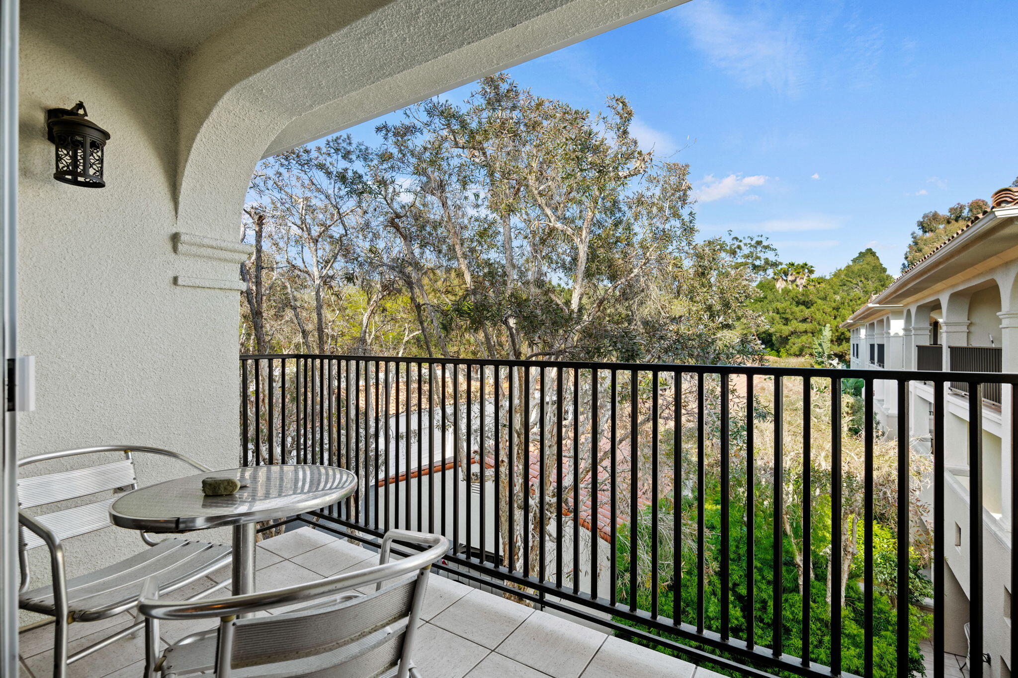 269 Por La Mar Circle Santa Barbara, CA 93103 - Photo 18 of 26 a balcony with table and chairs
