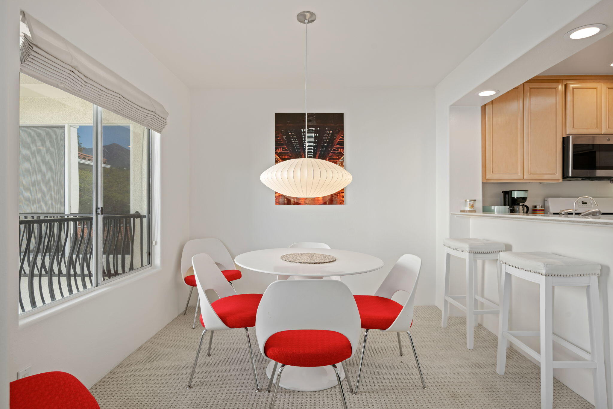 269 Por La Mar Circle Santa Barbara, CA 93103 - Photo 6 of 26 a room with stainless steel appliances furniture a rug and a large window