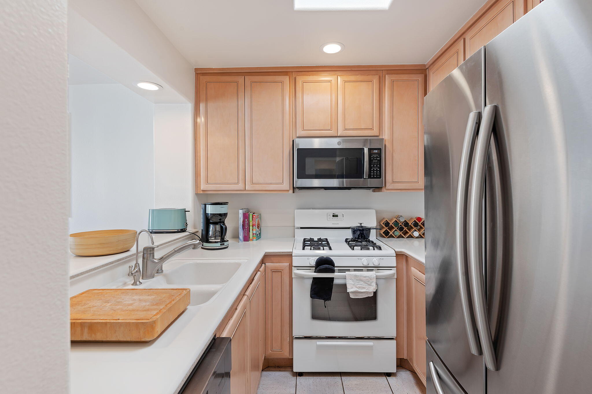 269 Por La Mar Circle Santa Barbara, CA 93103 - Photo 9 of 26 a kitchen with stainless steel appliances a stove a sink and a refrigerator