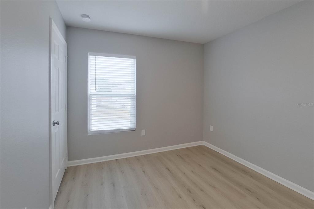 1709 Nebraska Loop Sumterville, FL 33585 - Photo 9 of 22 an empty room with a window