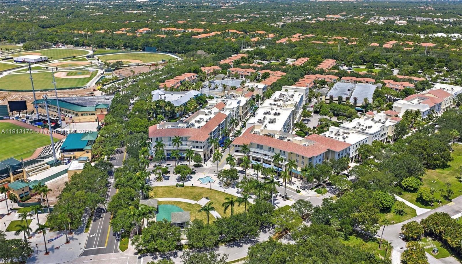 1200 Town Center Drive, Unit 217 Jupiter, FL 33458 - Photo 2 of 37 an aerial view of residential houses with outdoor space and river