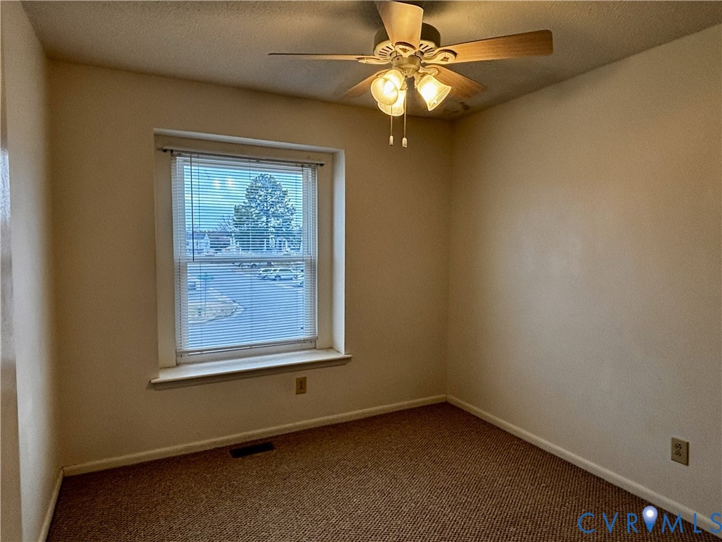 3860 Governors Way Virginia Beach, VA 23452 - Photo 19 of 22 an empty room with a window