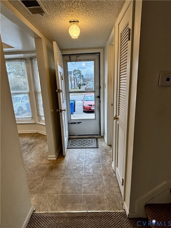 3860 Governors Way Virginia Beach, VA 23452 - Photo 2 of 22 a view of a hallway with paintings on the wall