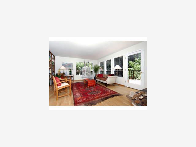 450 Bear Valley Road Aptos, CA 95003 - Photo 4 of 9 a living room with furniture and a large window