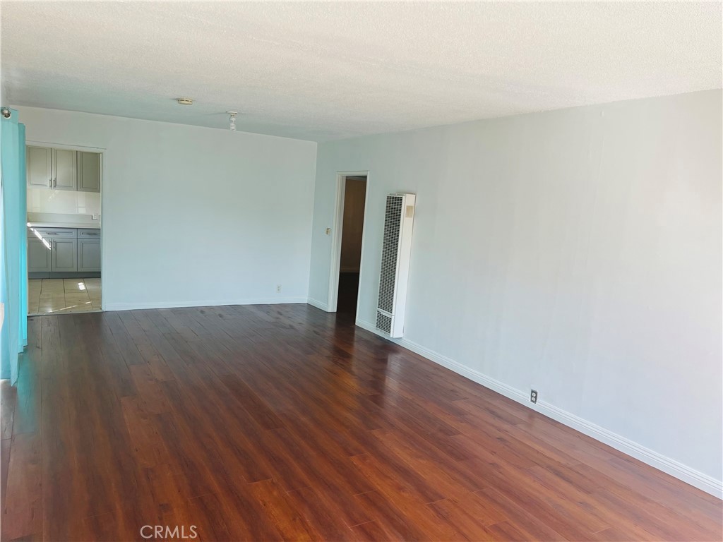 8051 Hellman Avenue Rosemead, CA 91770 - Photo 5 of 18 a view of a room with wooden floor