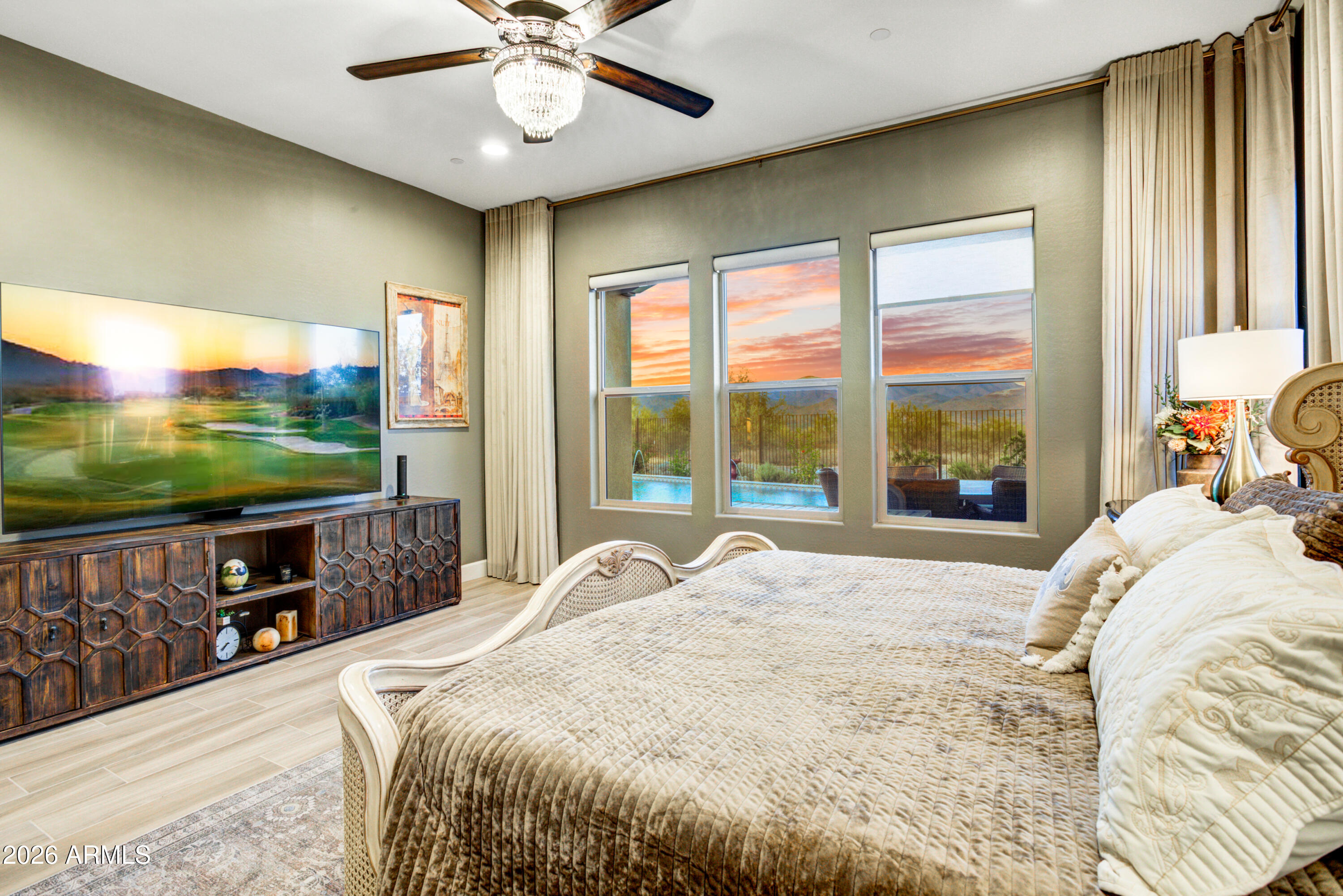 28517 North Camel Rock Court Rio Verde, AZ 85263 - Photo 17 of 39 a bed sitting in a bedroom next to a window