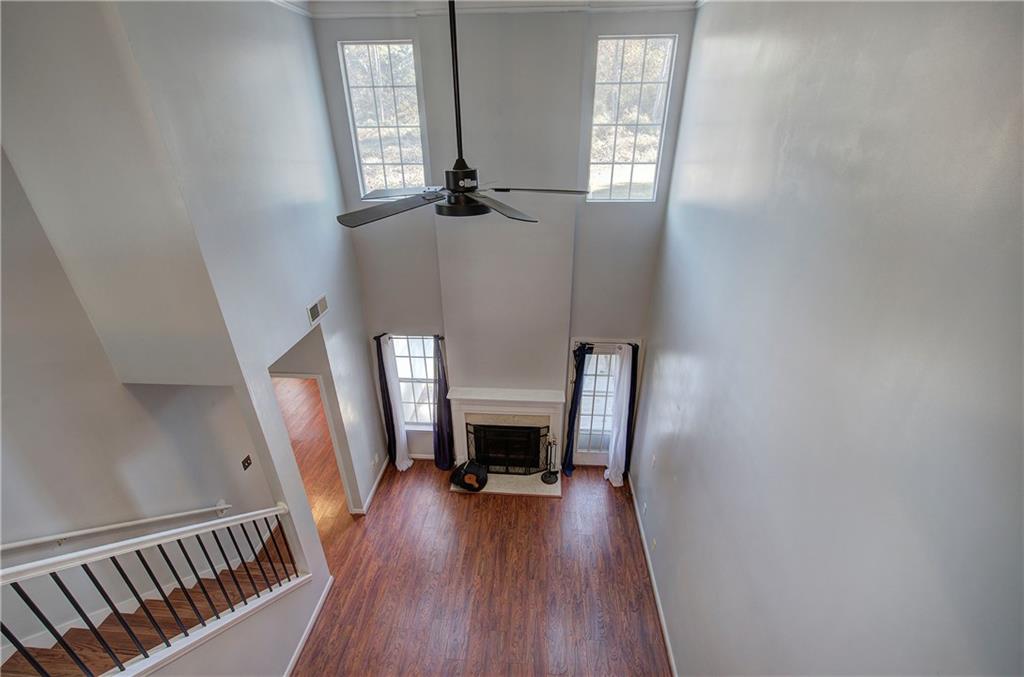 25 Haley Place, Unit 3 Cartersville, GA 30121 - Photo 24 of 45 a view of a livingroom with wooden floor fireplace and window