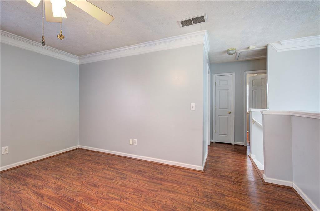 25 Haley Place, Unit 3 Cartersville, GA 30121 - Photo 27 of 45 wooden floor in an empty room