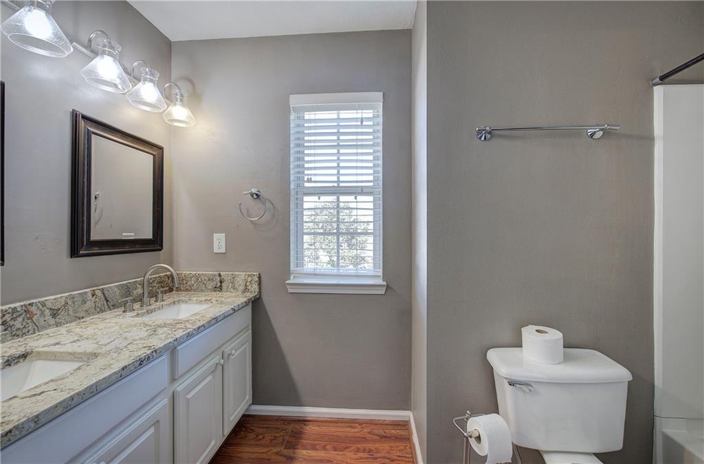 25 Haley Place, Unit 3 Cartersville, GA 30121 - Photo 30 of 45 a bathroom with a granite countertop sink toilet and shower