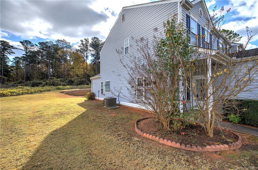 25 Haley Place, Unit 3 Cartersville, GA 30121 - Photo 34 of 45 a view of a house with a yard