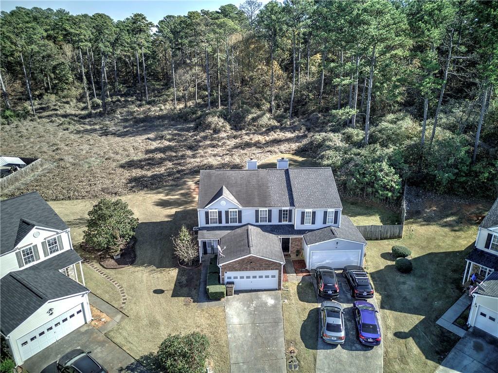 25 Haley Place, Unit 3 Cartersville, GA 30121 - Photo 39 of 45 an aerial view of a house with garden space and sitting area