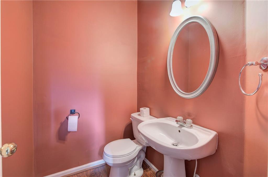 25 Haley Place, Unit 3 Cartersville, GA 30121 - Photo 7 of 45 a bathroom with a sink mirror and toilet