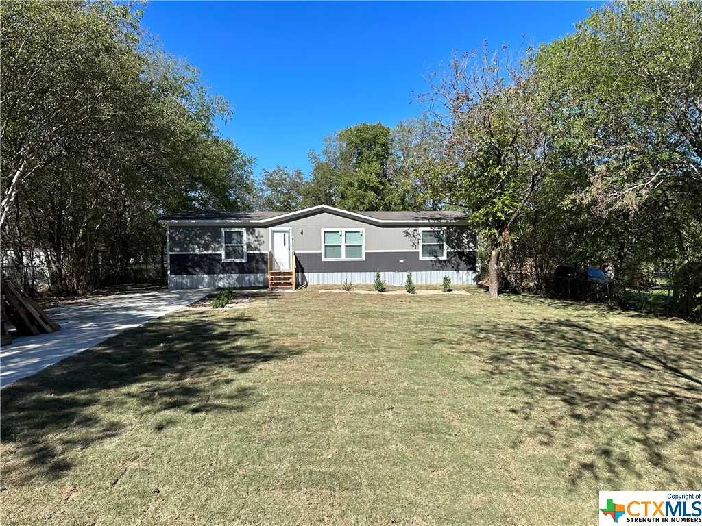 a house view with a swimming pool