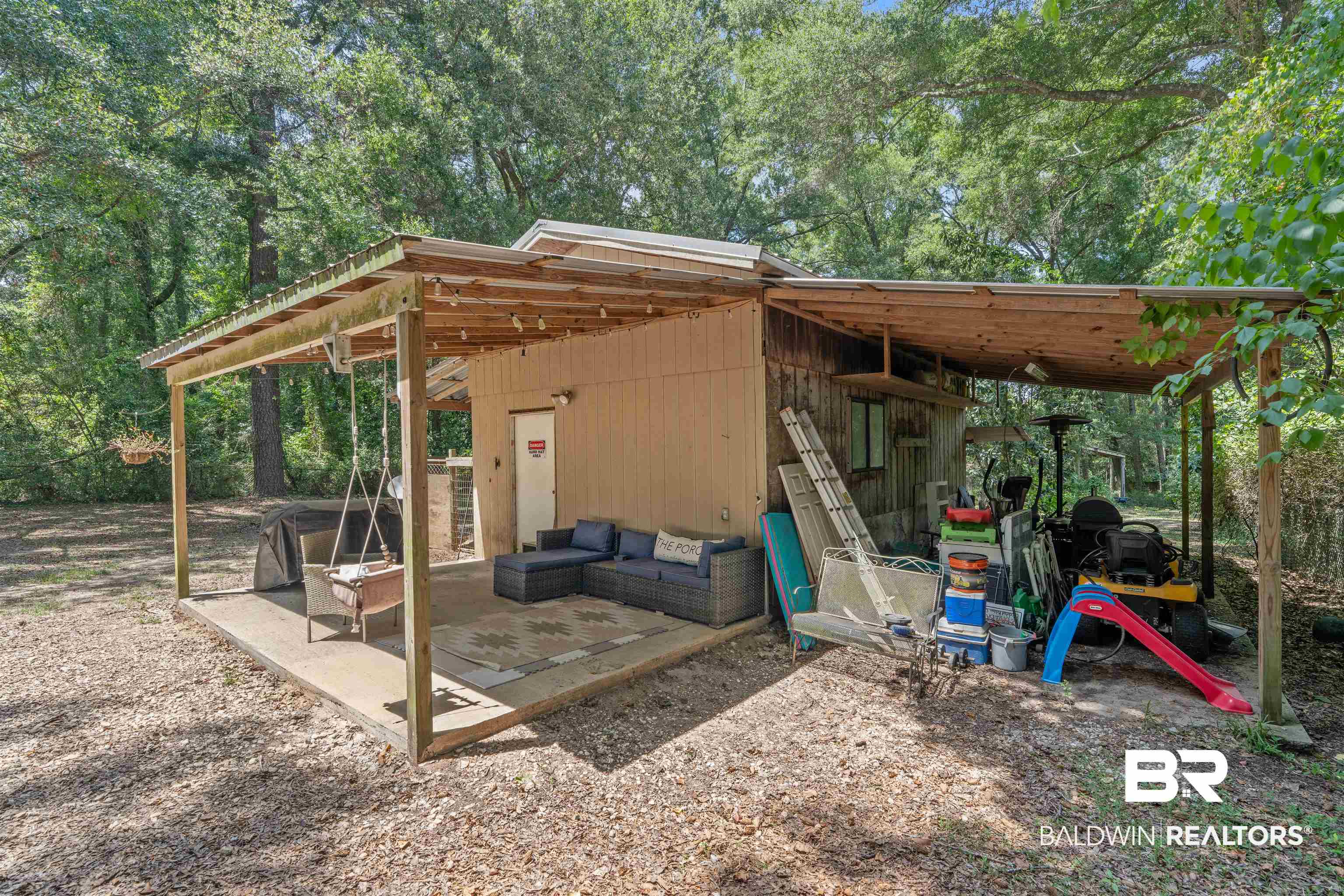 922 Dauphine Circle Daphne, AL 36526 - Photo 23 of 29 View of patio with view of scattered trees