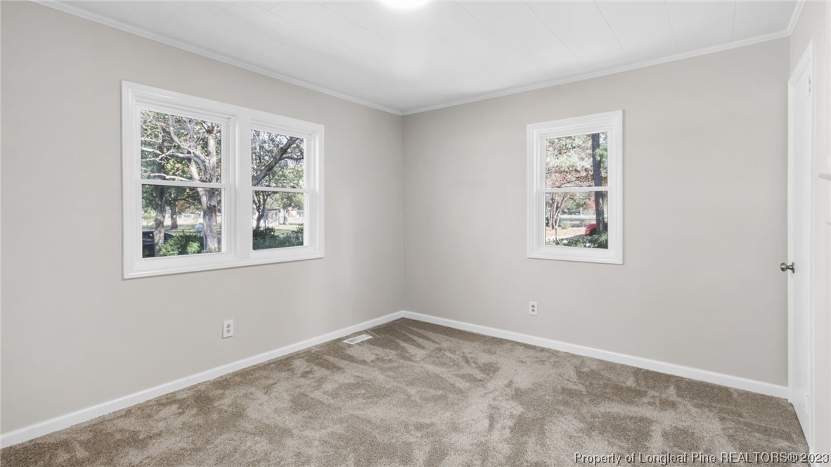 6114 Sandy Creek Road Stedman, NC 28391 - Photo 17 of 34 a view of empty room with window