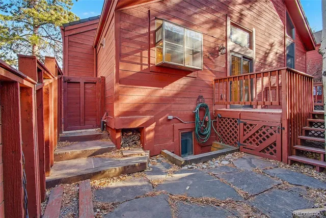 a view of a brick building with many windows