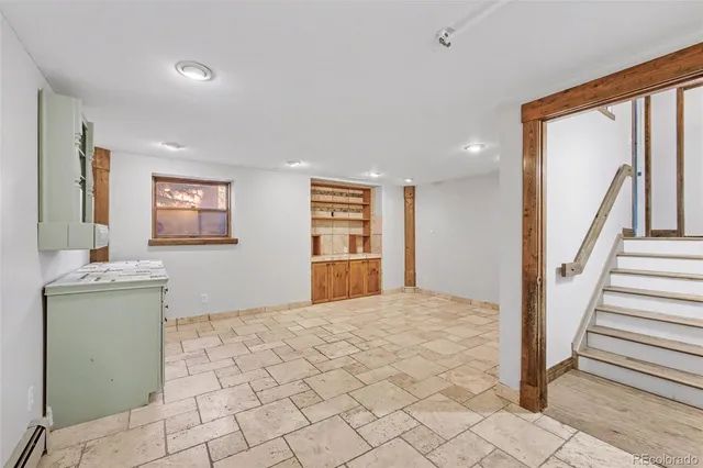 an aerial view of a house with mountain view