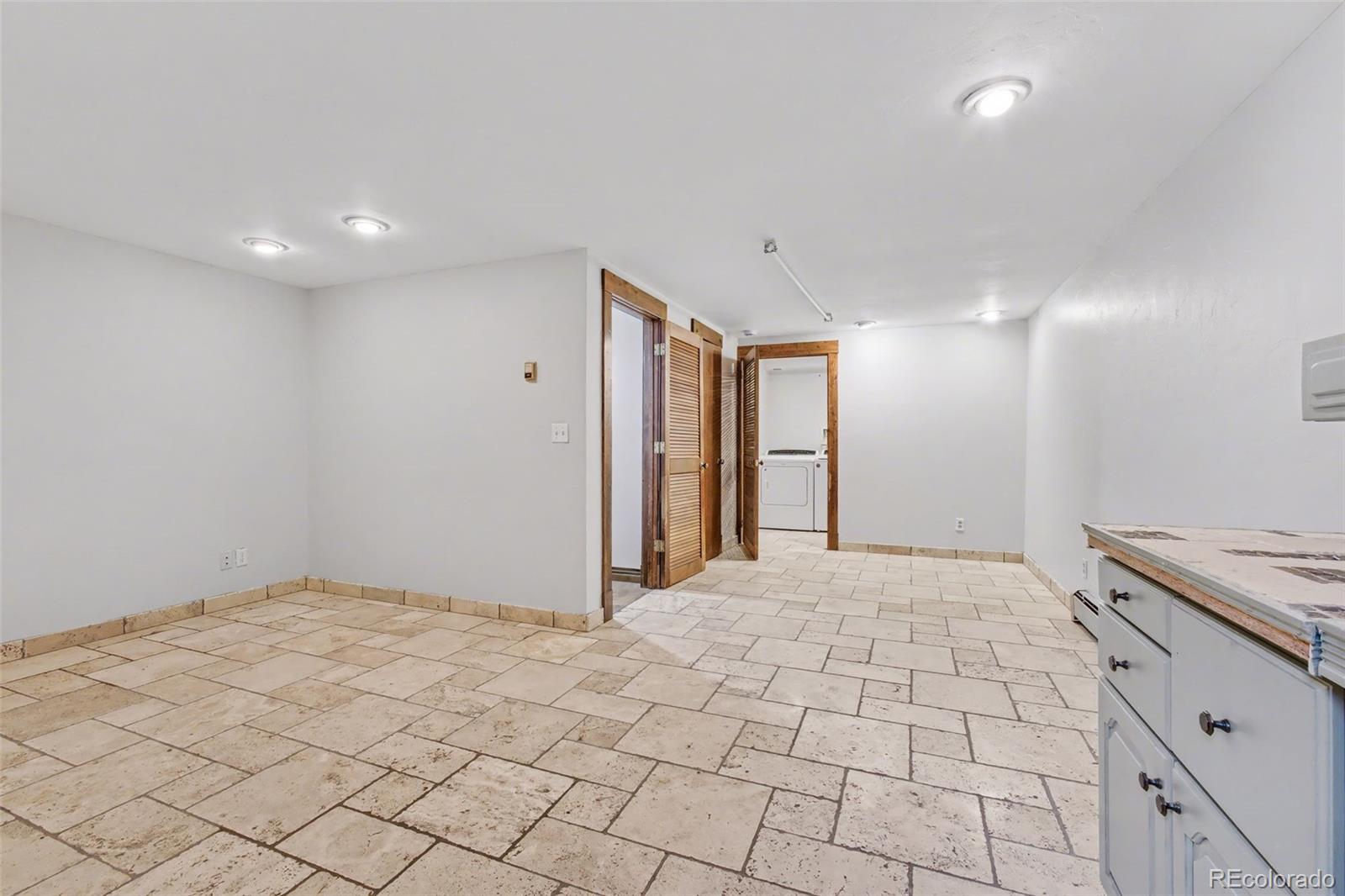 23666 Genesee Village Road Golden, CO 80401 - Photo 26 of 49 a view of an empty room and window