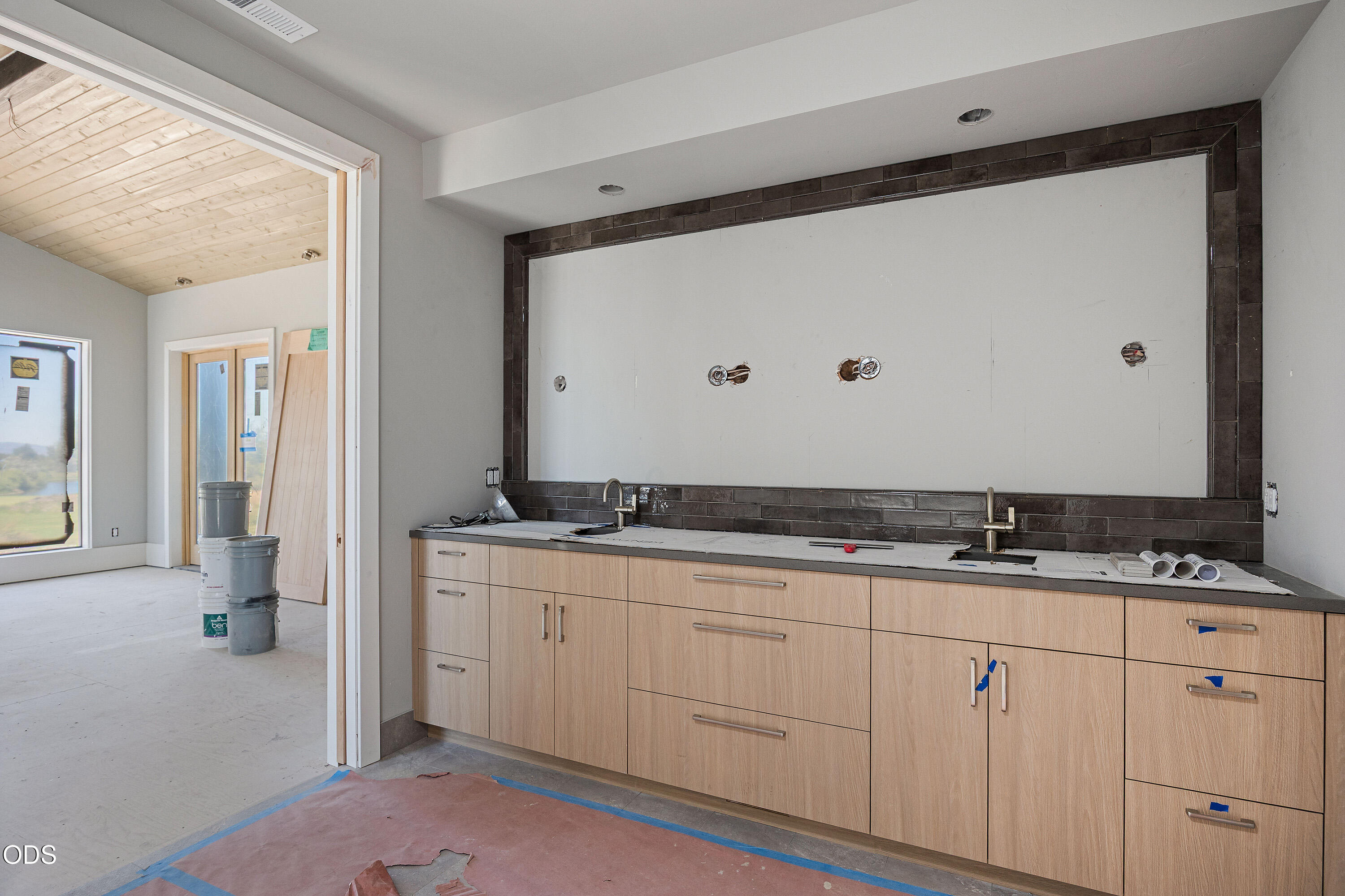 22936 Ghost Tree Lane Bend, OR 97701 - Photo 17 of 45 a bathroom with a granite countertop sink and a mirror