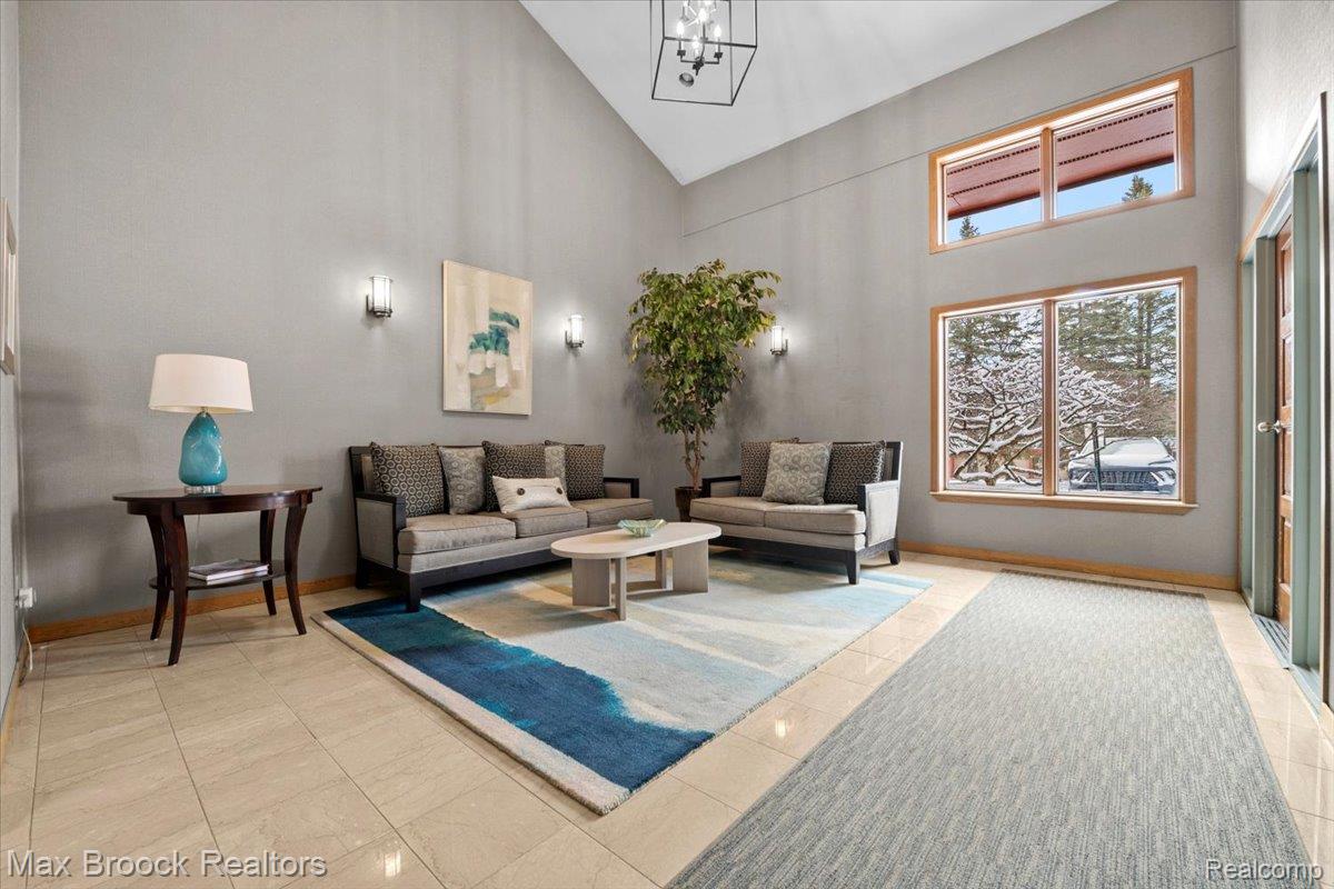 Lobby featuring lofted ceiling