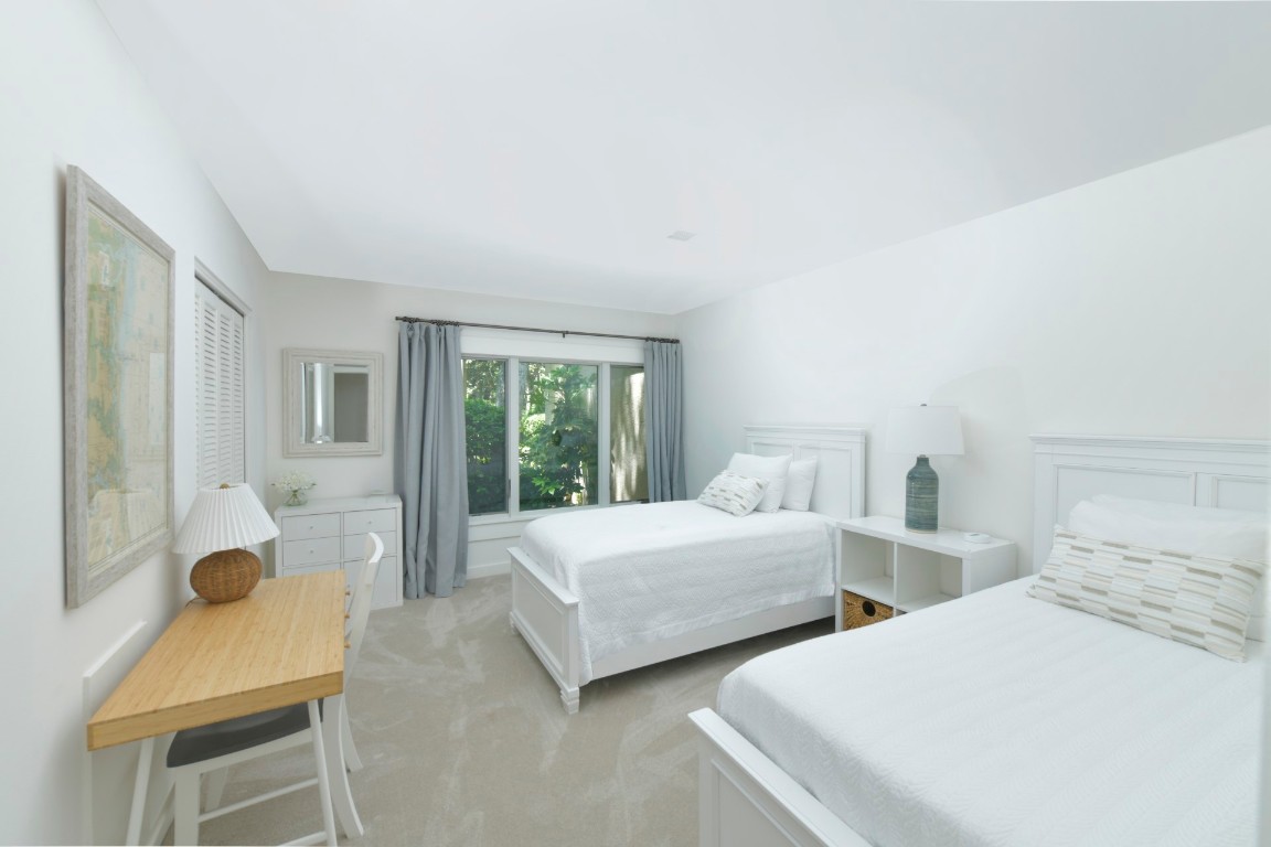 3314 Sea Marsh Road Fernandina Beach, FL 32034 - Photo 19 of 32 a bedroom with two beds and large window