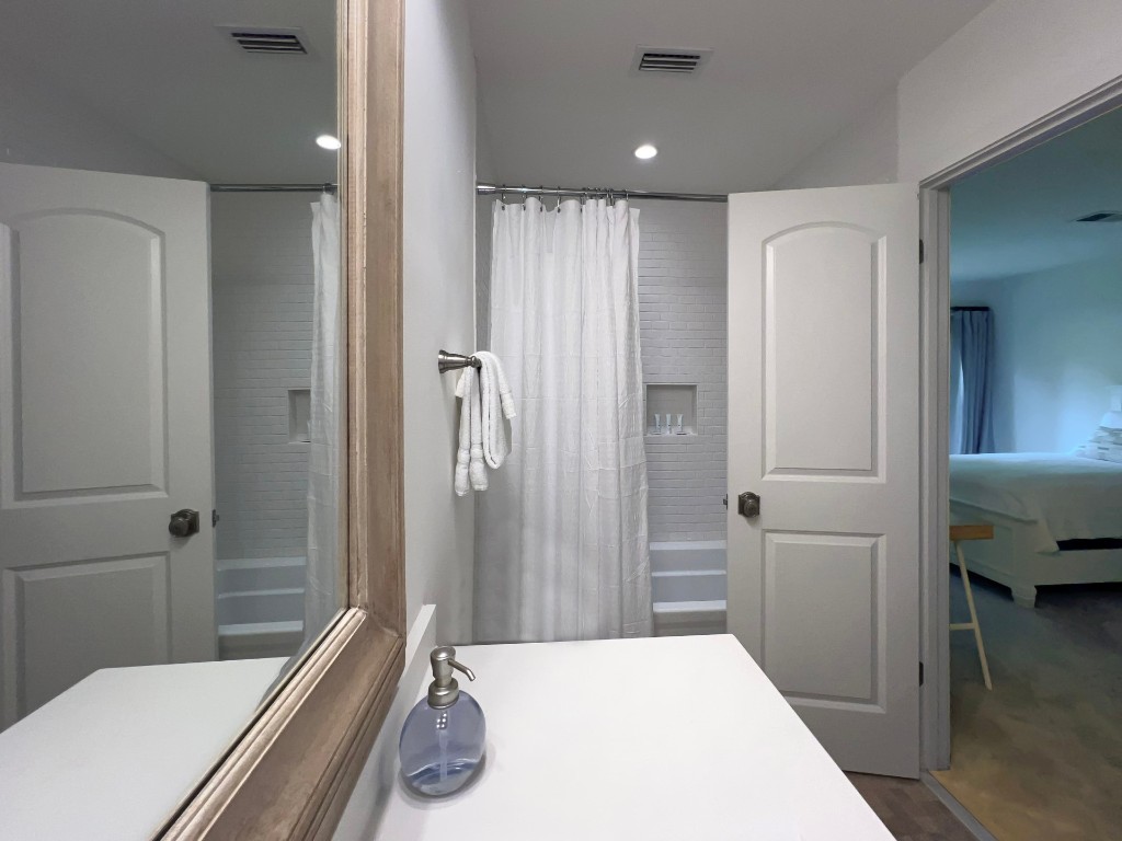 3314 Sea Marsh Road Fernandina Beach, FL 32034 - Photo 21 of 32 a bathroom with a tub and shower