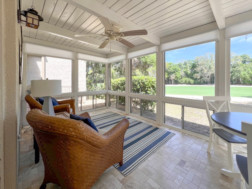 3314 Sea Marsh Road Fernandina Beach, FL 32034 - Photo 23 of 32 a living room with furniture and a large window