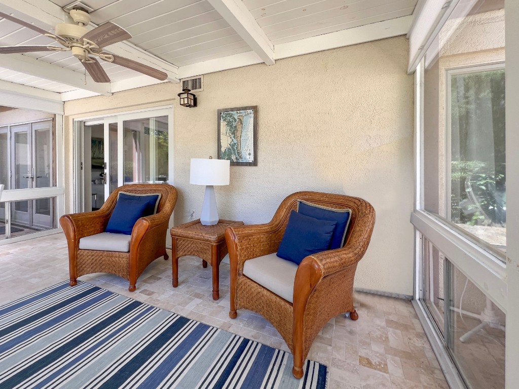 3314 Sea Marsh Road Fernandina Beach, FL 32034 - Photo 24 of 32 a living room with furniture and a window