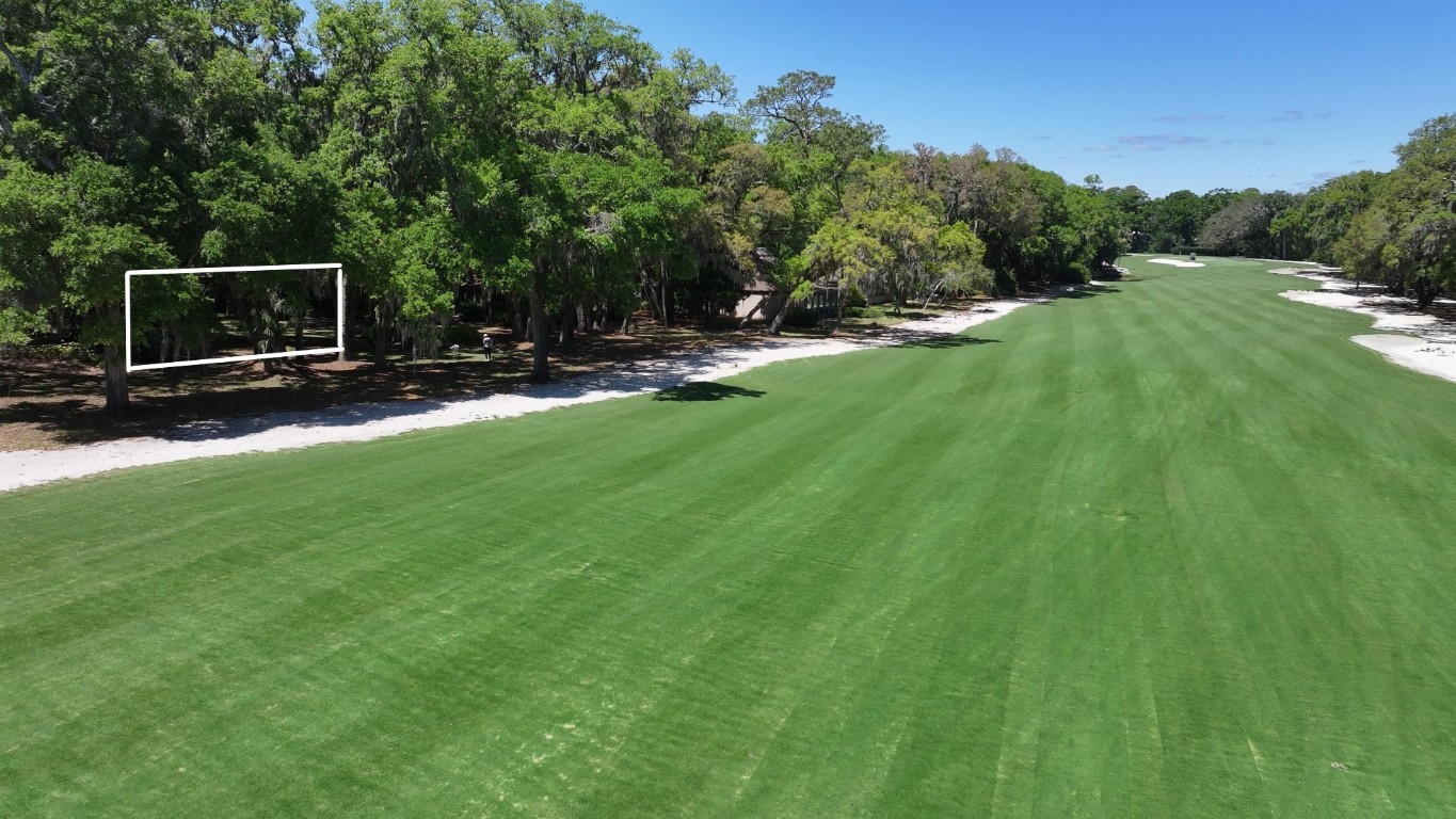 3314 Sea Marsh Road Fernandina Beach, FL 32034 - Photo 28 of 32 a view of outdoor space with deck and yard