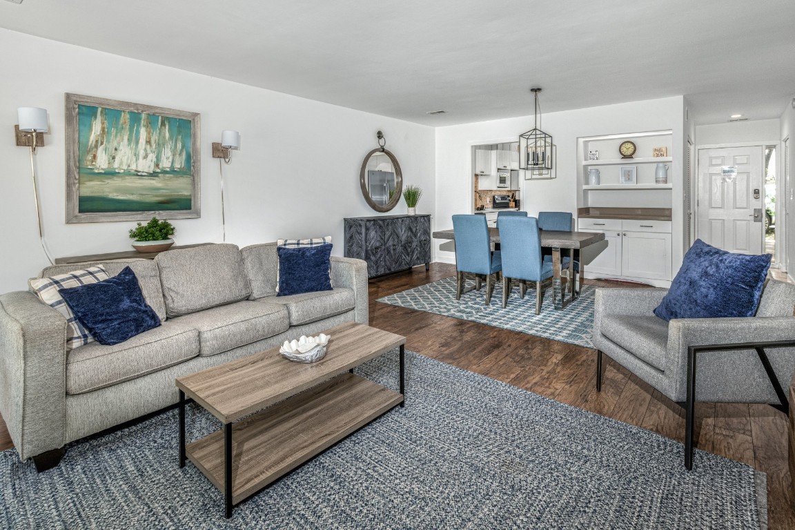 3314 Sea Marsh Road Fernandina Beach, FL 32034 - Photo 10 of 32 a living room with furniture and wooden floor