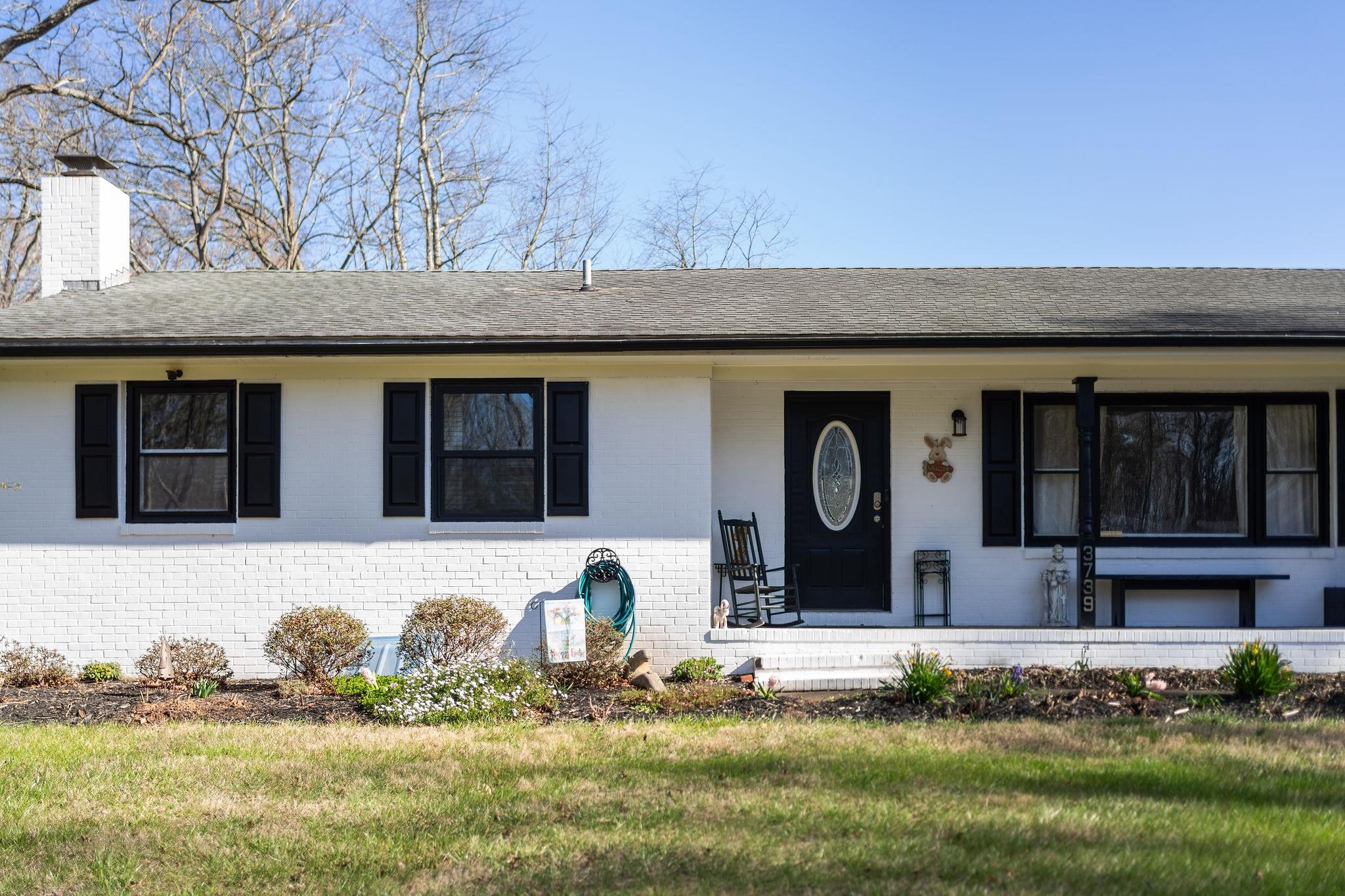 3739 Stony Point Road Charlottesville, VA 22911 - Photo 4 of 72 a front view of a house with garden