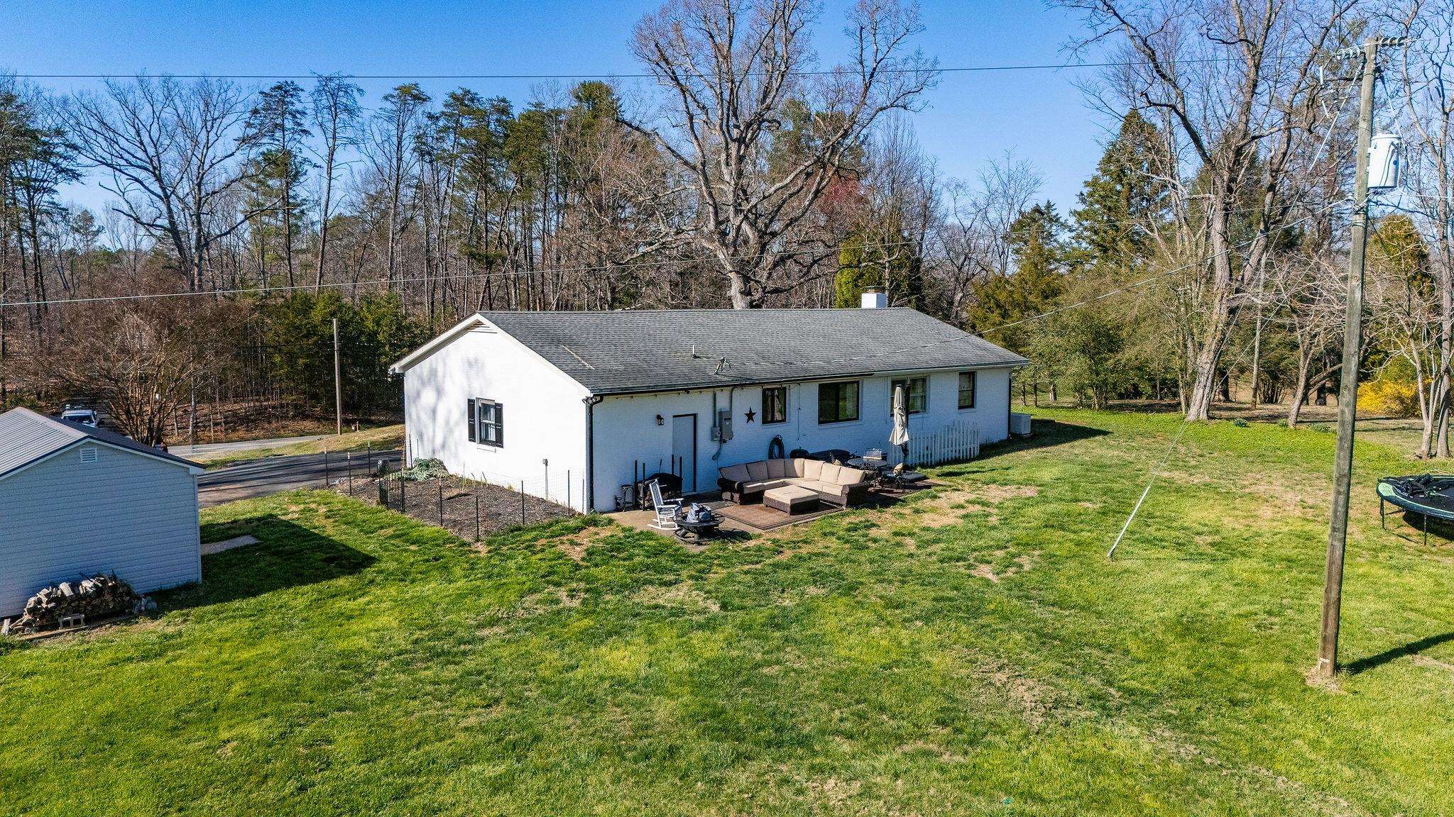 3739 Stony Point Road Charlottesville, VA 22911 - Photo 47 of 72 a front view of a house with garden