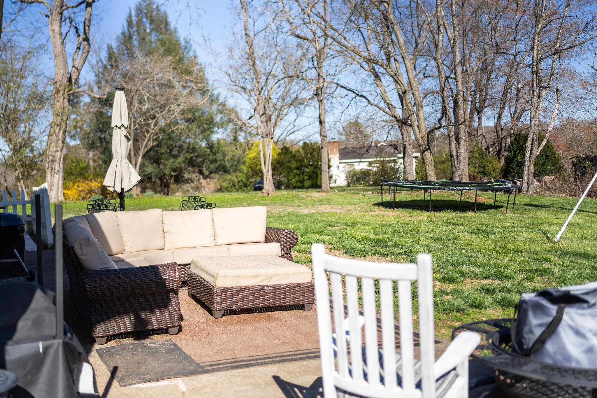 3739 Stony Point Road Charlottesville, VA 22911 - Photo 49 of 72 a view of a patio with couches chairs and a yard