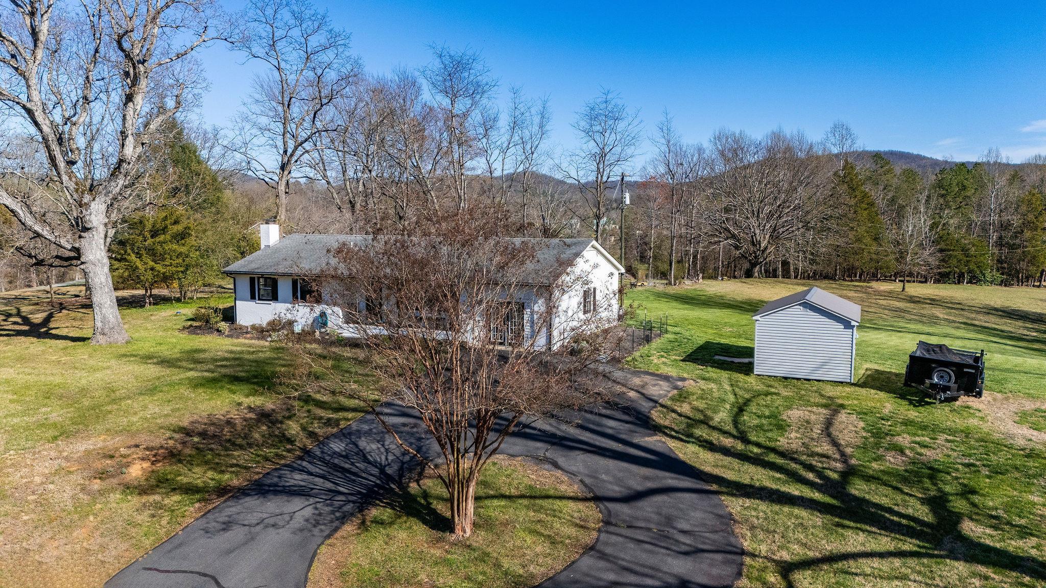 3739 Stony Point Road Charlottesville, VA 22911 - Photo 57 of 72 a front view of a house with a yard