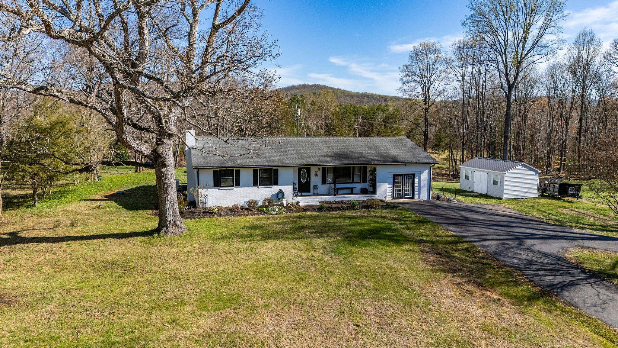 3739 Stony Point Road Charlottesville, VA 22911 - Photo 59 of 72 a front view of house with yard and swimming pool