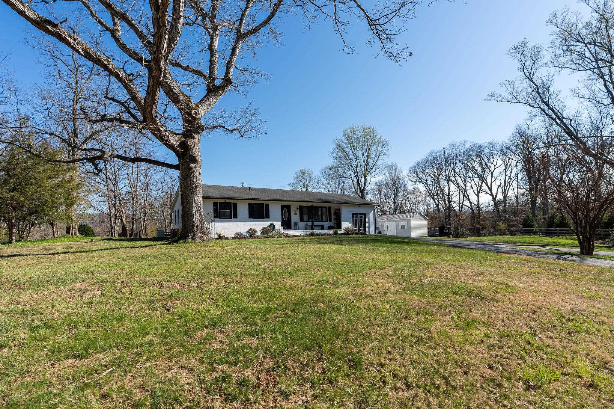 3739 Stony Point Road Charlottesville, VA 22911 - Photo 60 of 72 a front view of a house with a garden