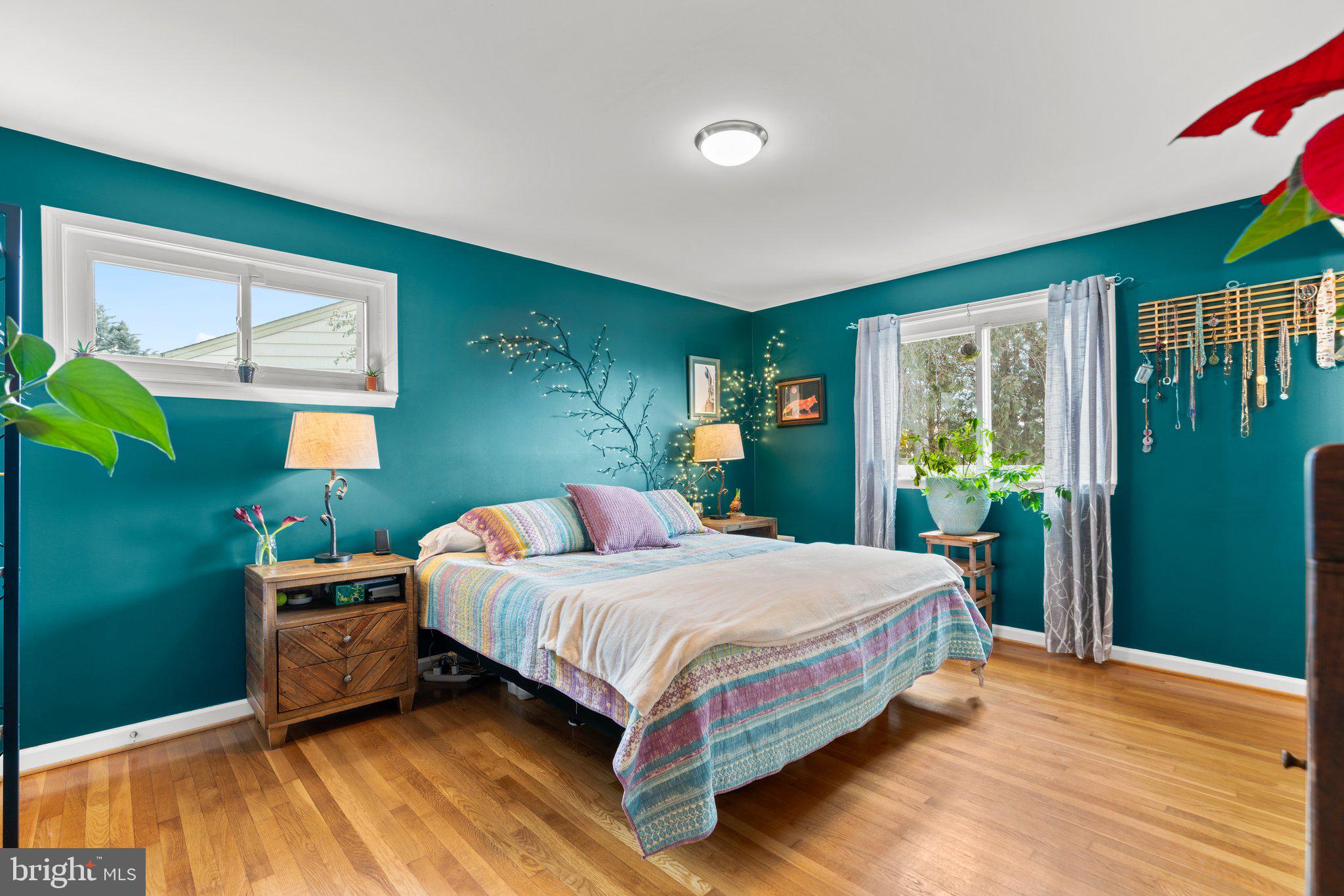 609 Perth Place Silver Spring, MD 20901 - Photo 25 of 46 a bedroom with a bed and a window