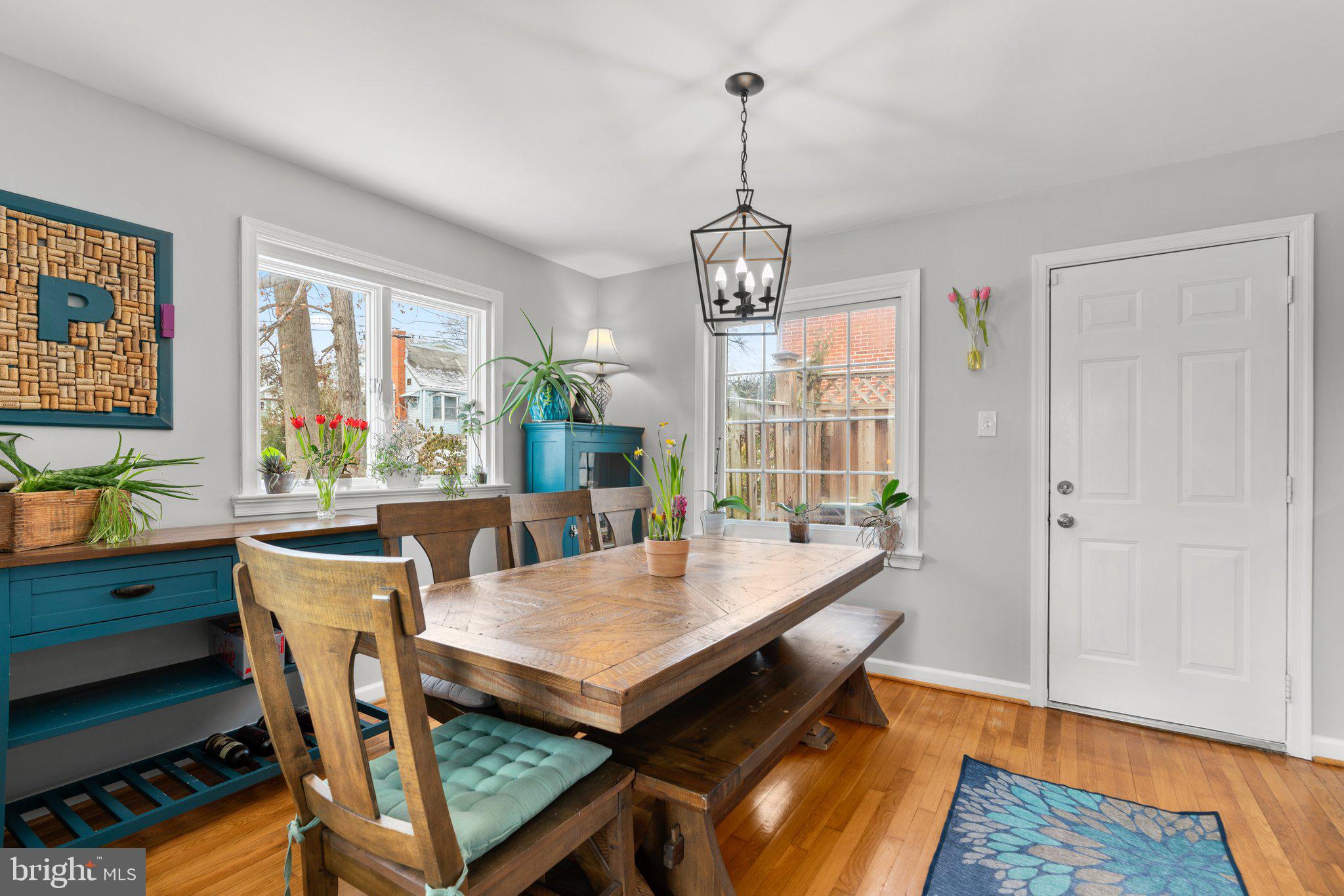 609 Perth Place Silver Spring, MD 20901 - Photo 10 of 46 a view of a dining room with furniture window and wooden floor